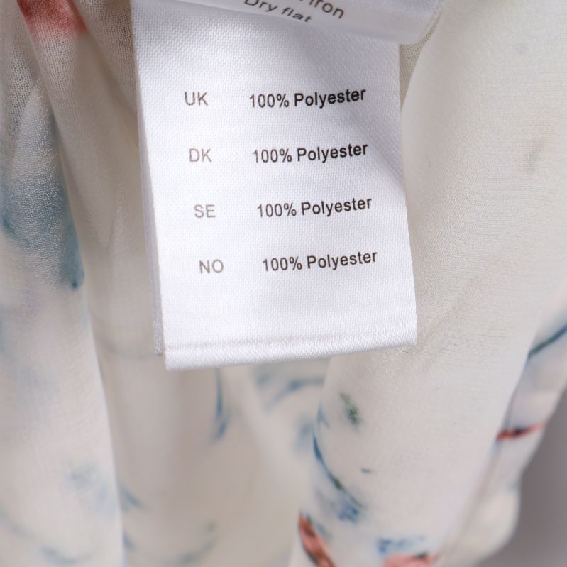 Materialetikett med 100% polyester