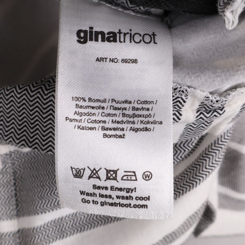 Materialetikett visar 100% bomull