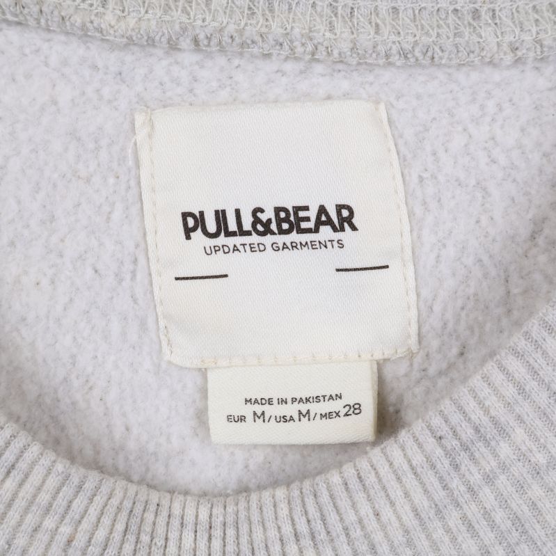 Pull & Bear logotyp på etikett inuti tröjan