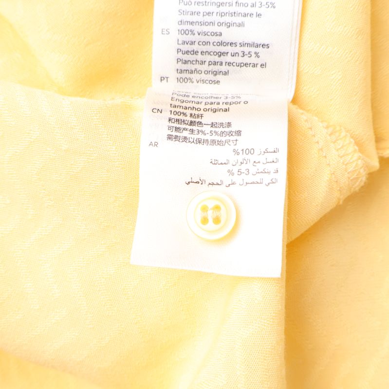 Materialinformation och extra knapp på etikett