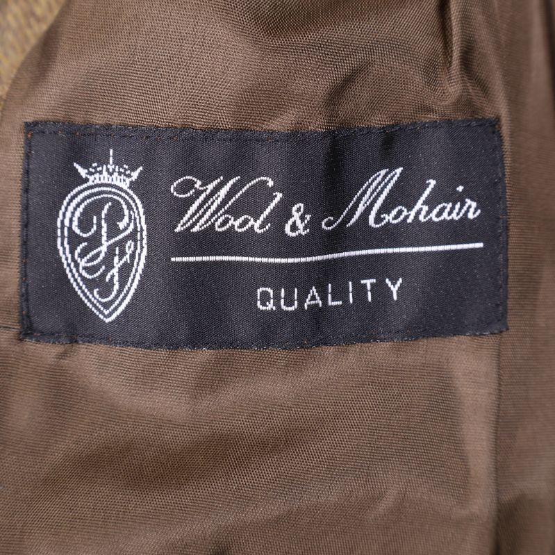 Etikett med Wool & Mohair Quality