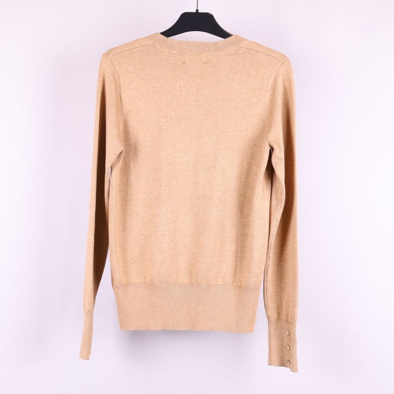 Beige tröja bakifrån