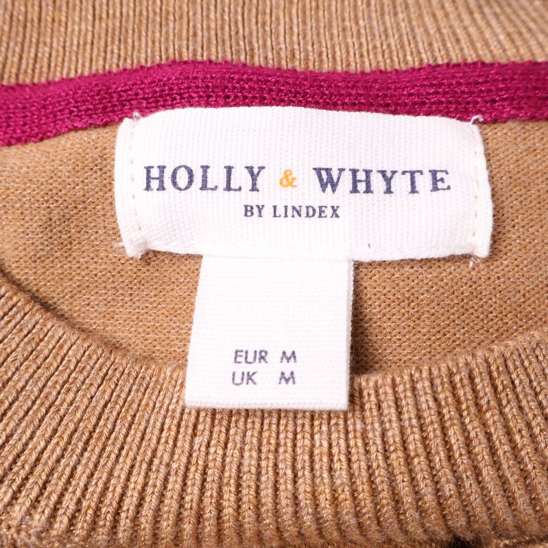 Märkesetikett för Holly & Whyte