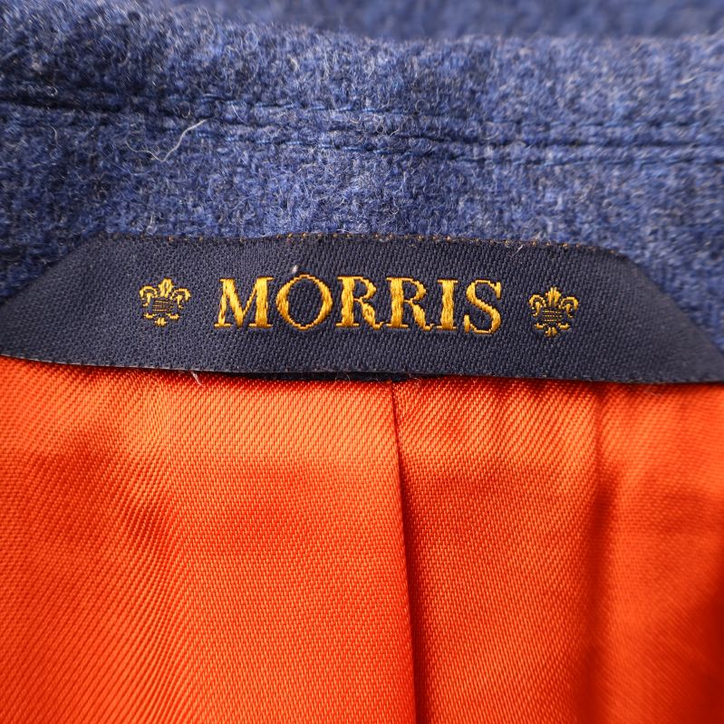 Etikett med Morris logotypen inuti kavajen