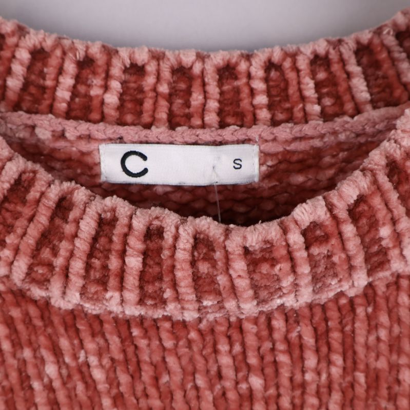 Label C med storlek S i tröjan