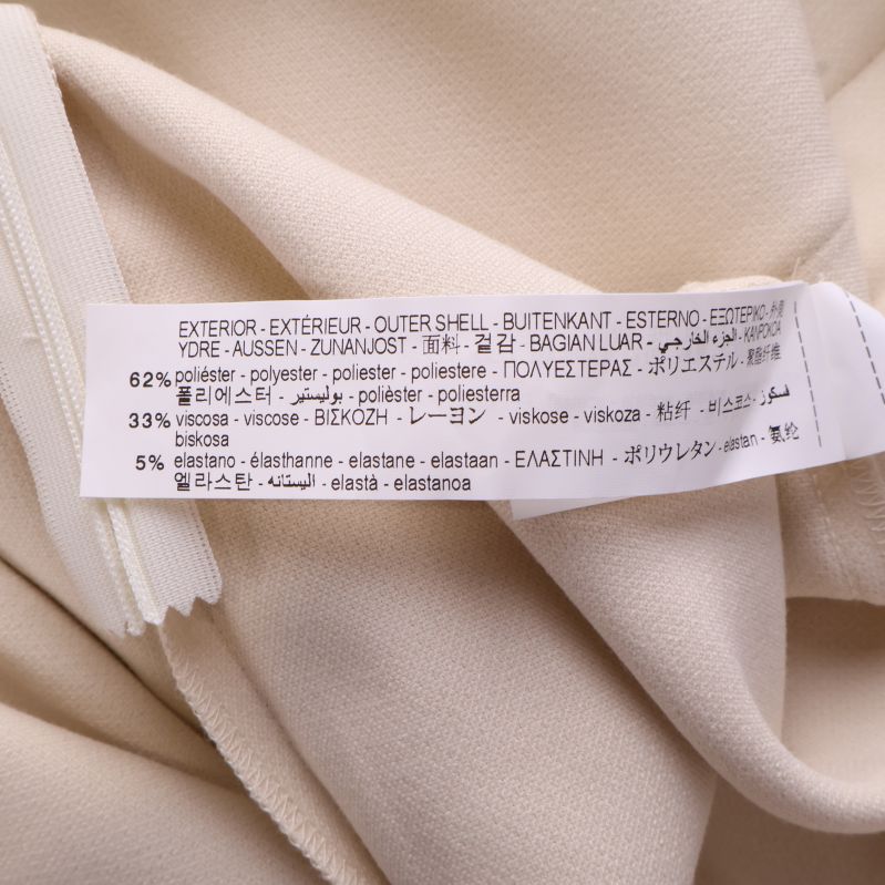 Materialetikett med polyester och elastan