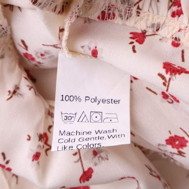 Materialetikett för 100% polyester