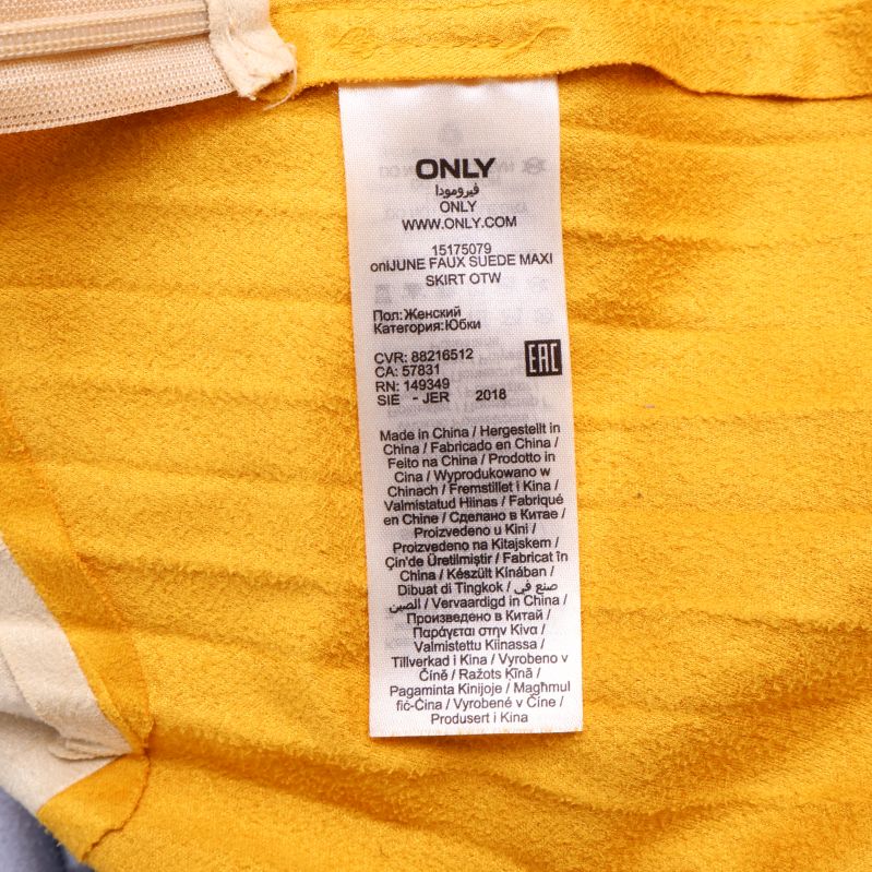 Materialinformation på etikett, 100% polyester