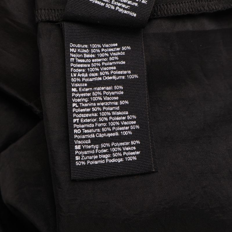 Detaljerad etikett med materialinformation
