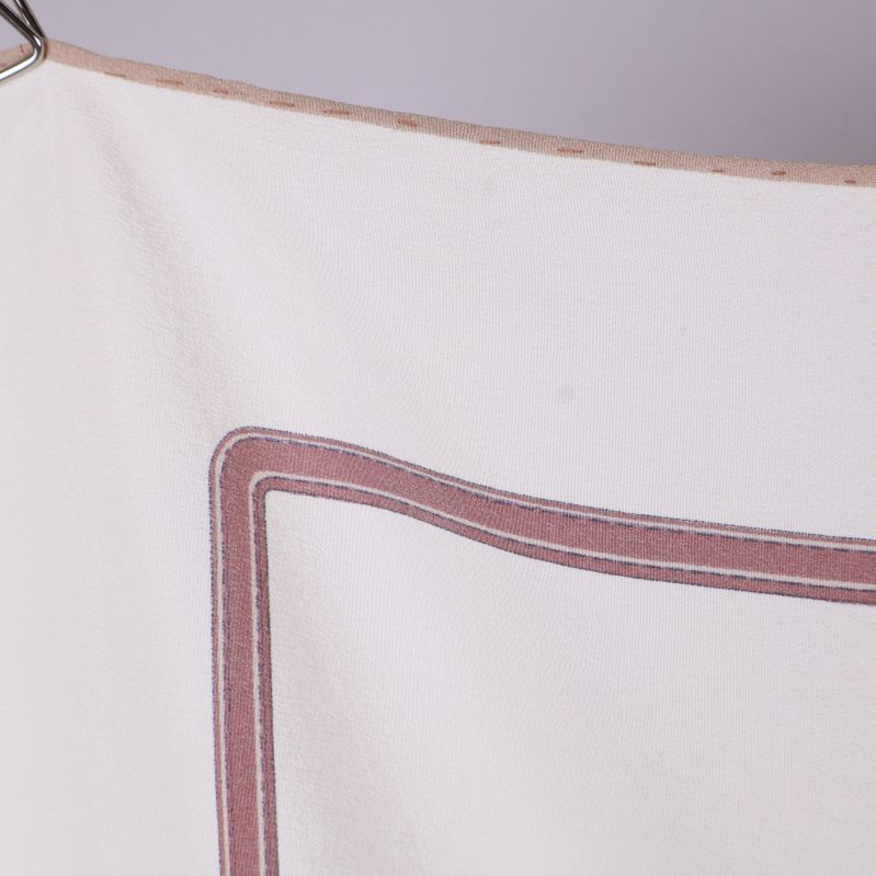 Kant med bruna ränder på sjalen