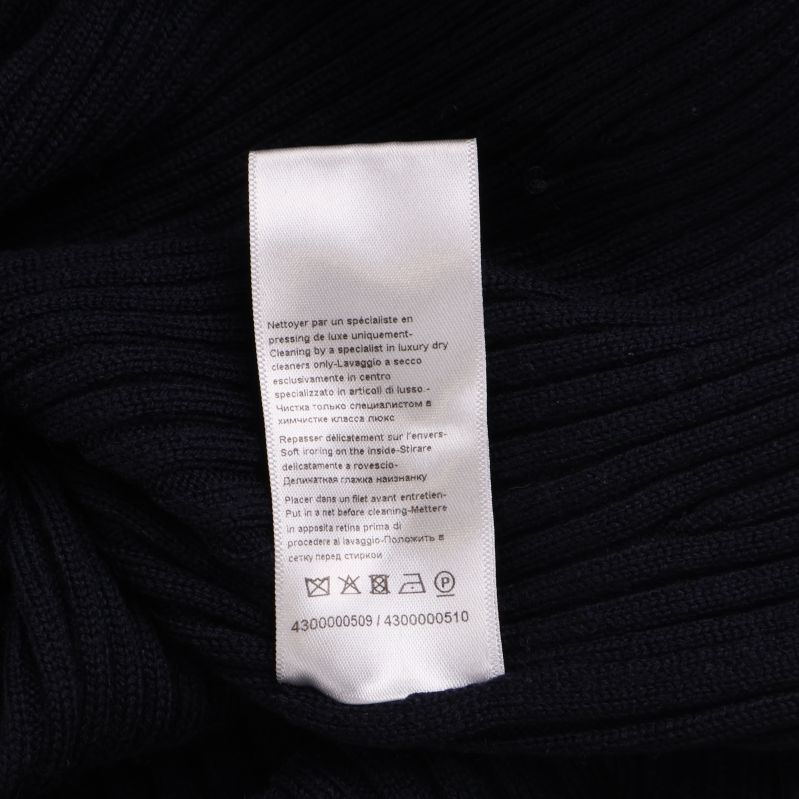 Tvättsymboler på klänningens etikett