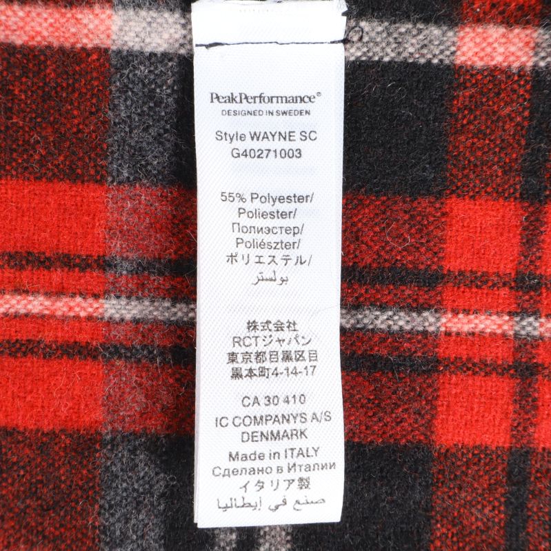 Materialetikett som visar 55% polyester