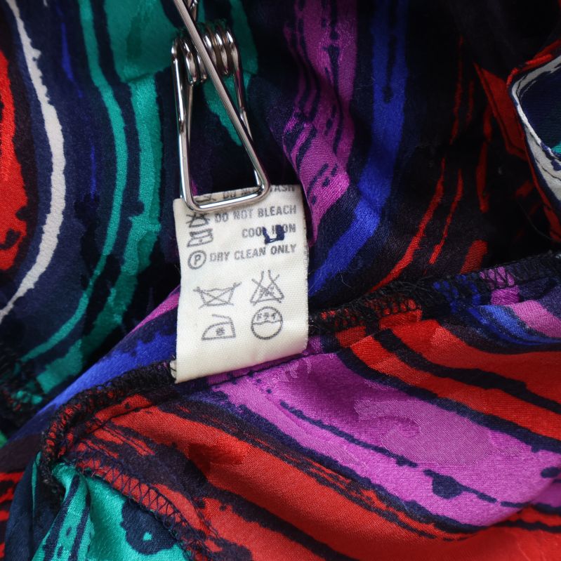 Tvättinstruktioner för skjortan