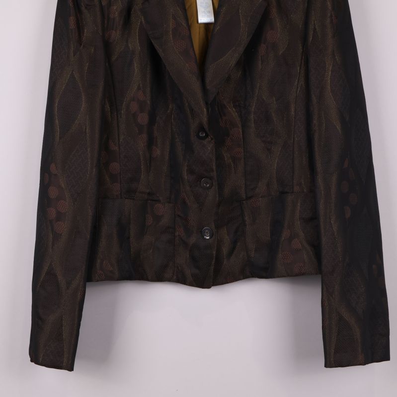 Närbild av kavaj nedre del