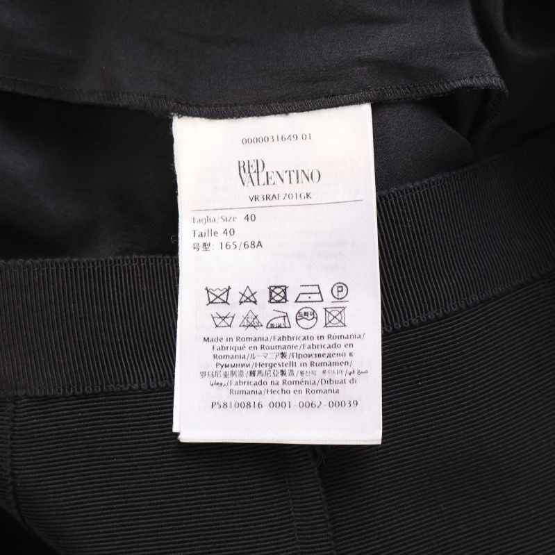 Tvättrådsetikett med storleksinformation