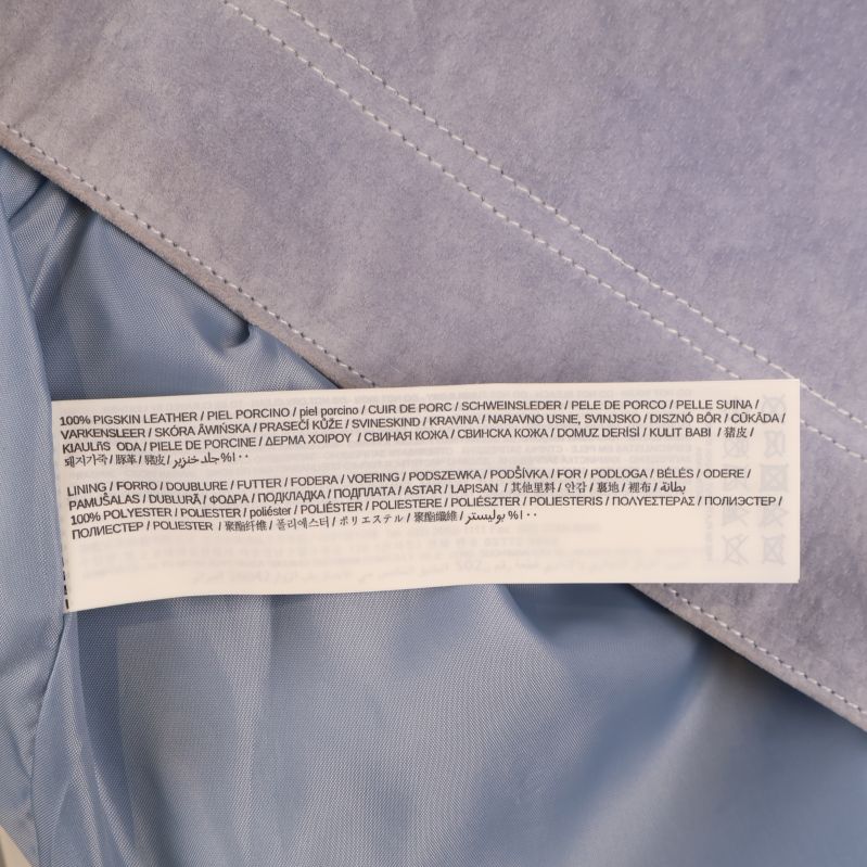 Materialetikett med detaljer på olika språk