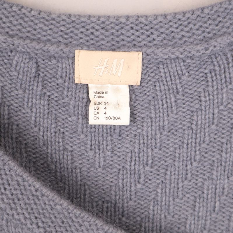 H&M-etikett med storleksinformation