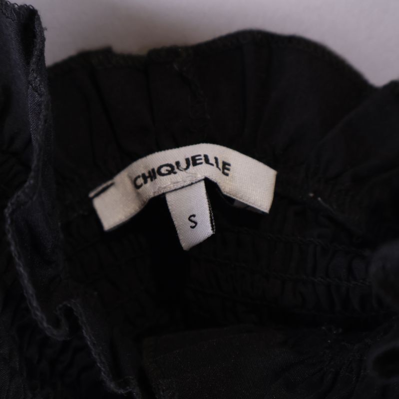 Materiallapp visar 60% bomull och 40% polyester