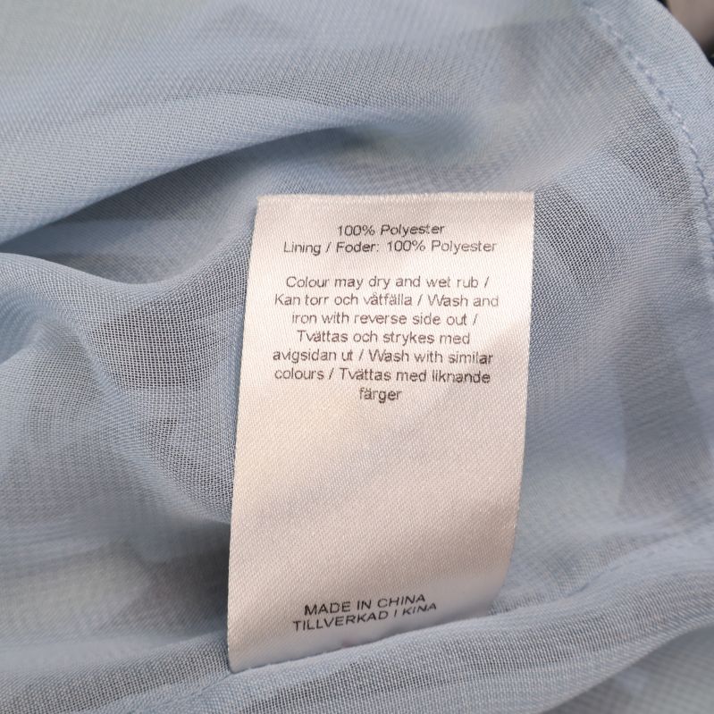 Materialetikett med 100% polyester