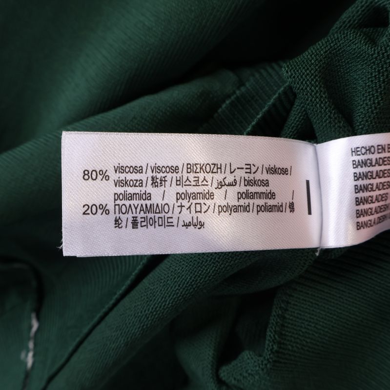 Materialetikett som visar viskos och polyamid