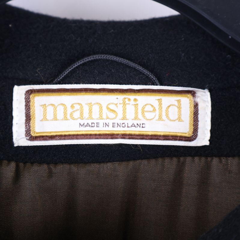 Mansfield-märket på insidan av kappan