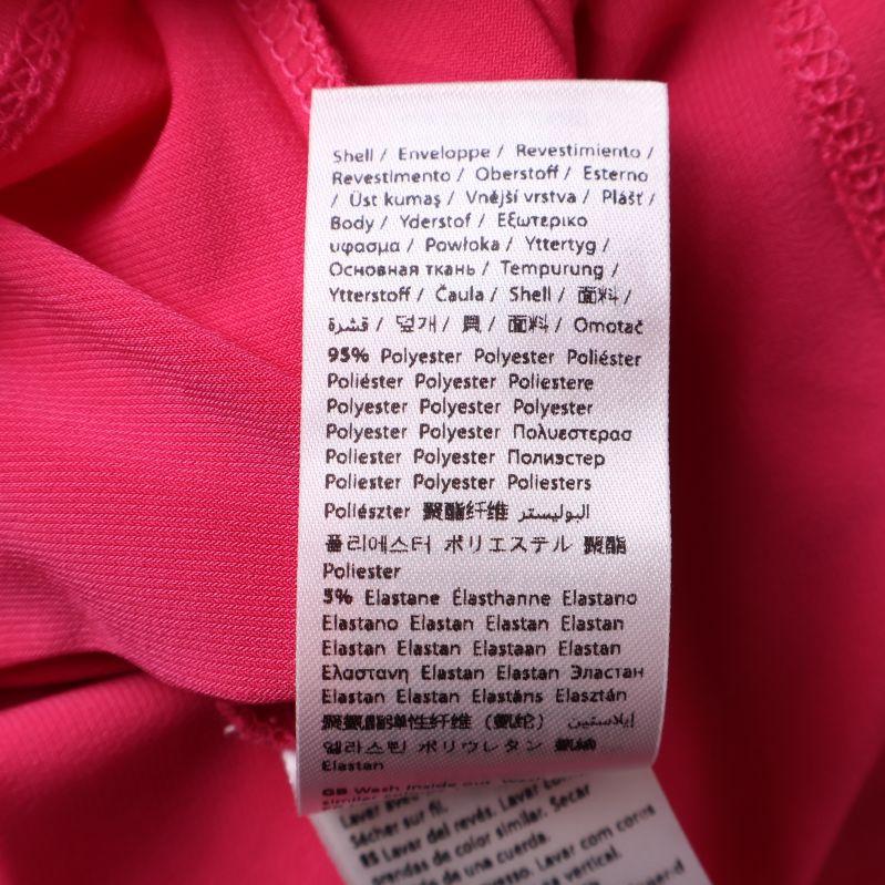 Materialkomposition på etikett, 95% polyester, 5% elastan
