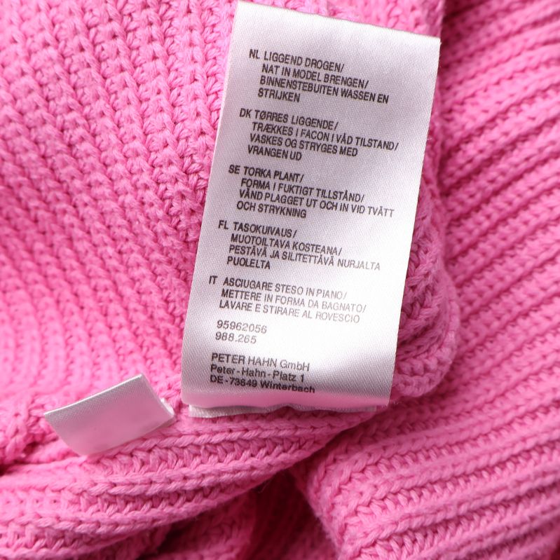 Skötselrådsetikett på tröjan