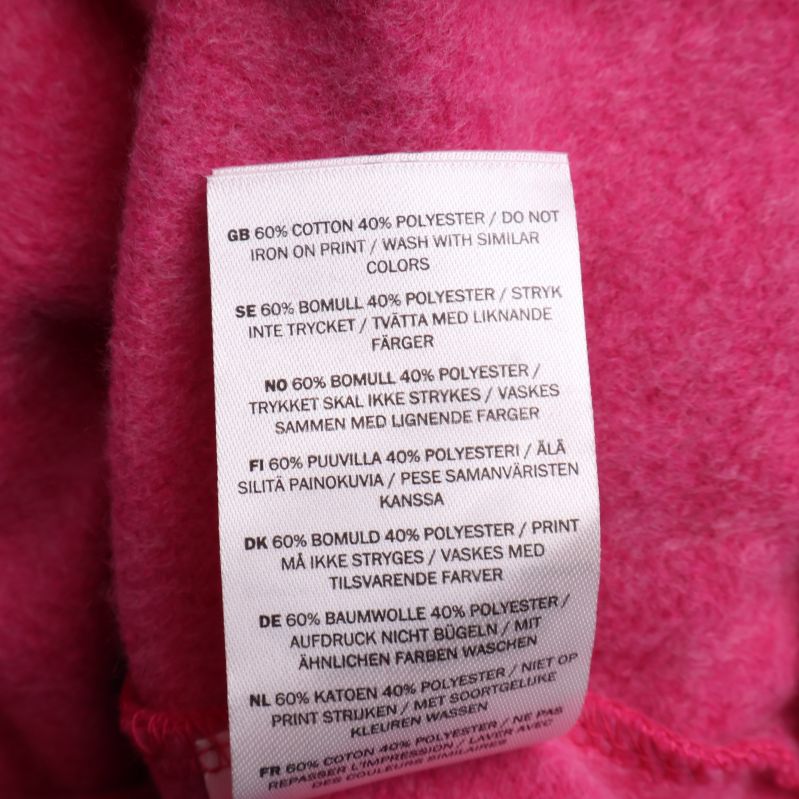 Materialetikett på insidan av hoodie