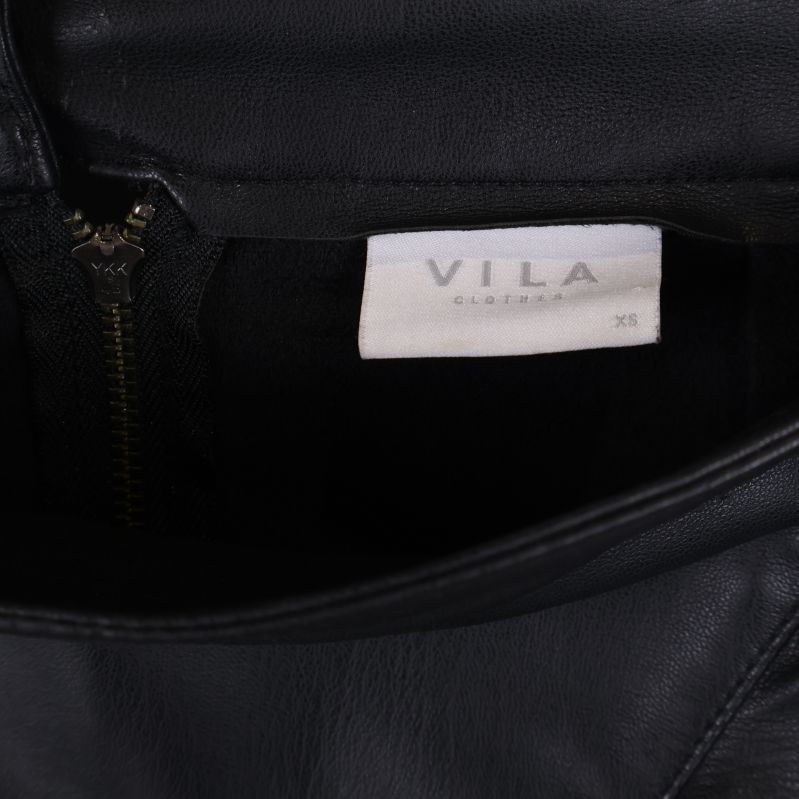 Märketikett VILA synlig inuti kjolen