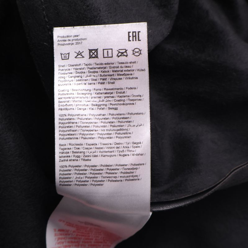 Materialinformation på kjolens etikett