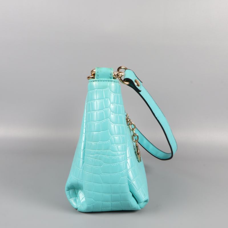 Andra sidan av turkos väska