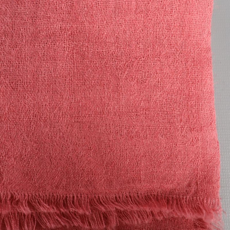 Närbild på texturen av rosa sjal