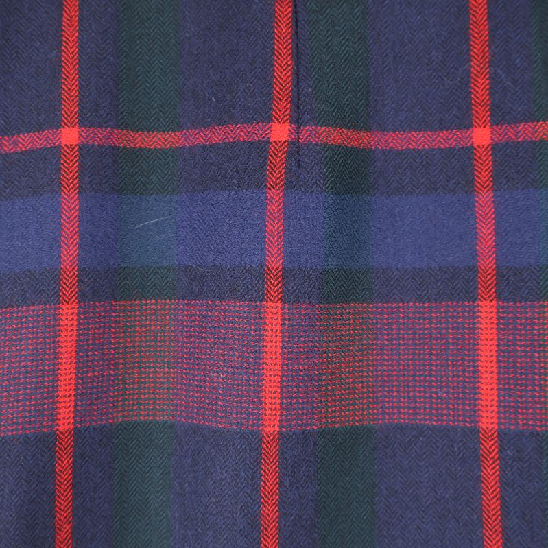 Närbild på byxornas texturmönster