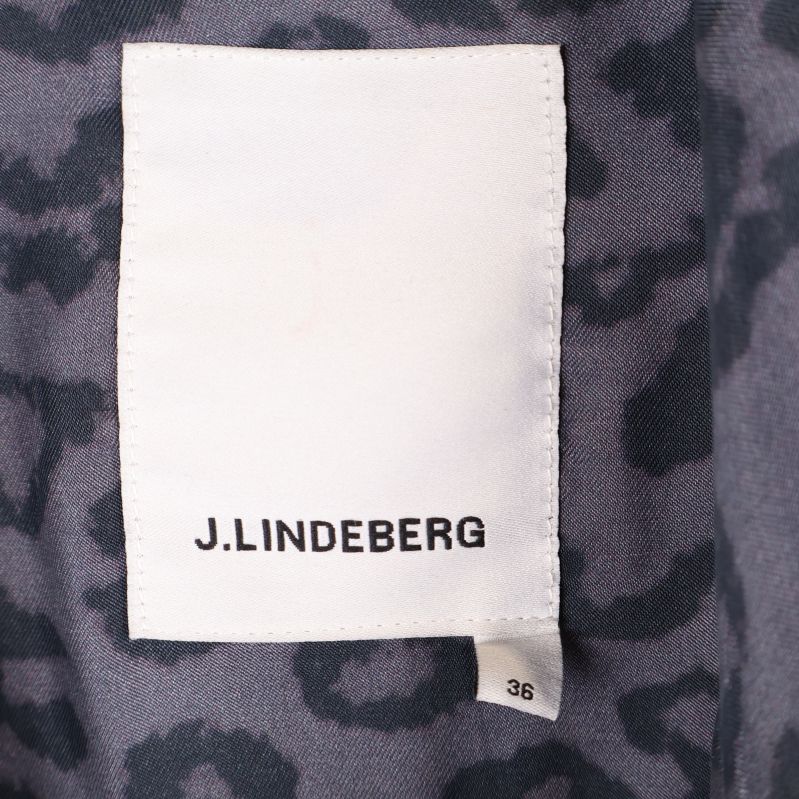 Etikett med J. Lindeberg och storlek