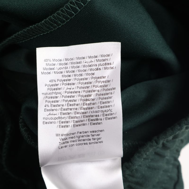 Materialetikett med detaljerad sammansättning