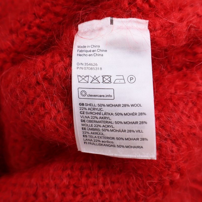 Materialetikett med tvättråd och sammansättning