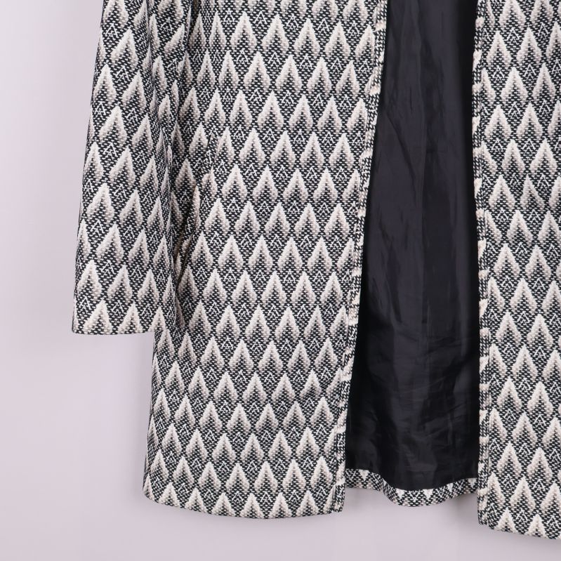 Nederdel av jacka med svart innerfoder