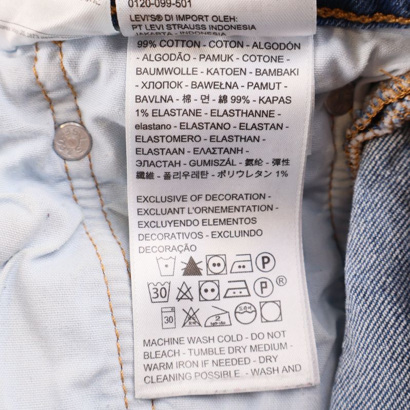 Materiallapp visar 99% bomull, 1% elastan