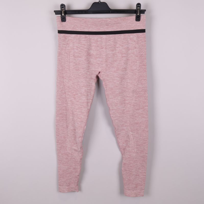 Rosa leggings med svart rand runt midjan 