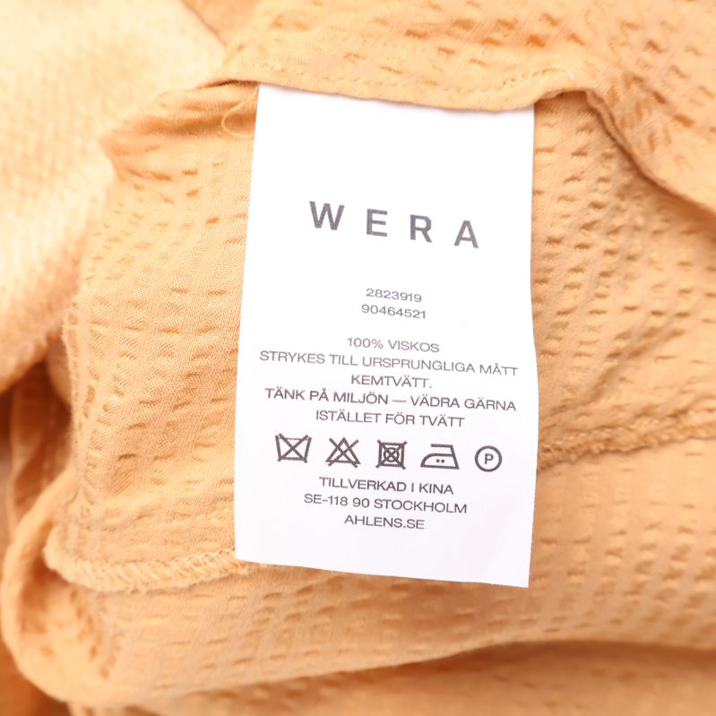 Materiallapp visar 100% viskos och WERA-märke
