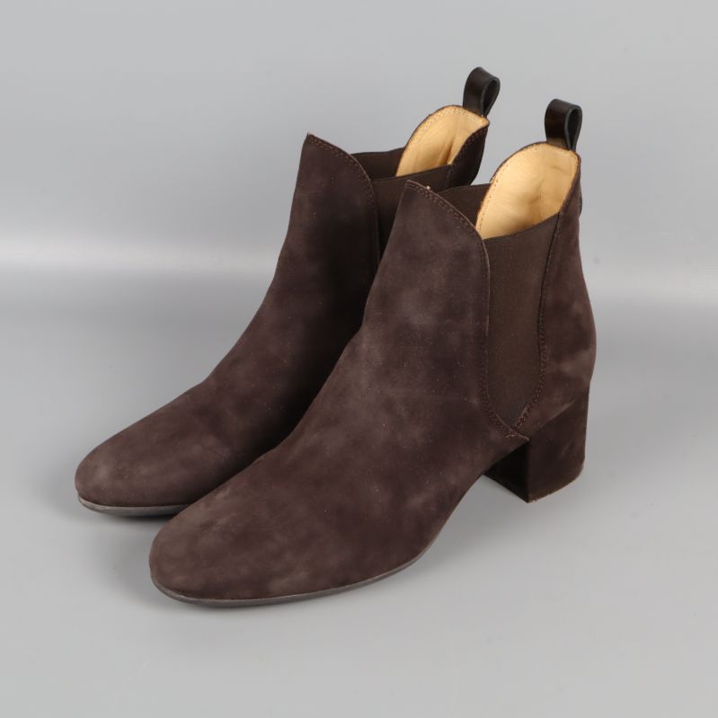 Par mörkbruna mockaboots med klack från sidan