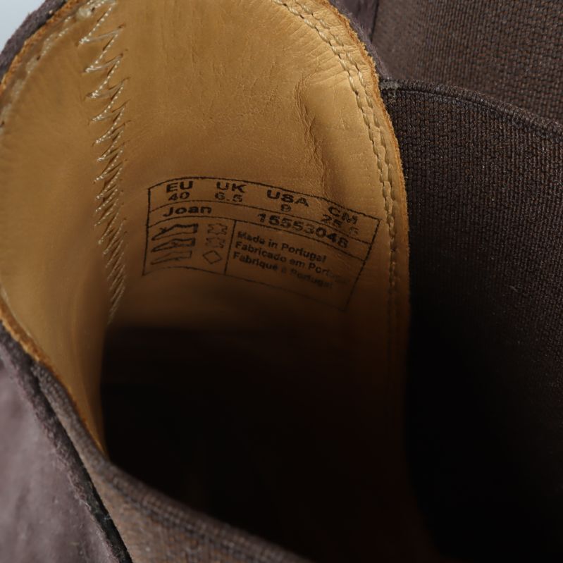 Storleksetikett inuti boots visar EU 39 och materialinformation