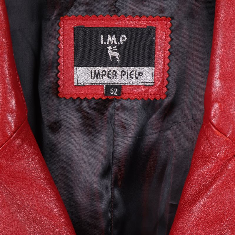 Närbild på varumärkesetikett IMP Imper Piel