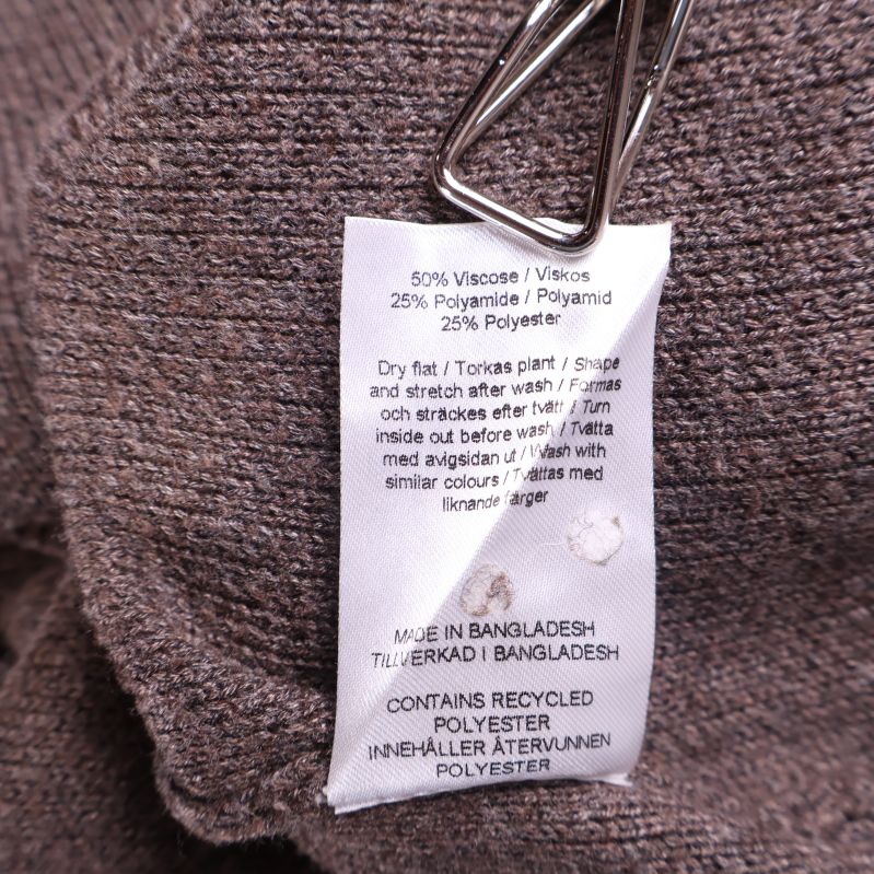 Materiallapp med information om viskos, polyamid och polyester