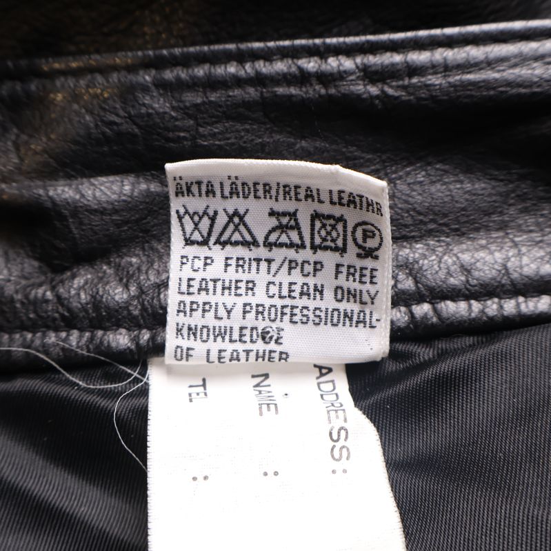 Materialetikett med information om äkta läder