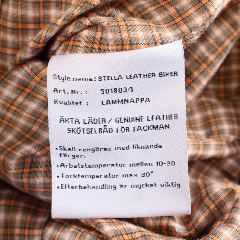 Tvättrådsetikett visar Stella Leather Biker i äkta lammnappa