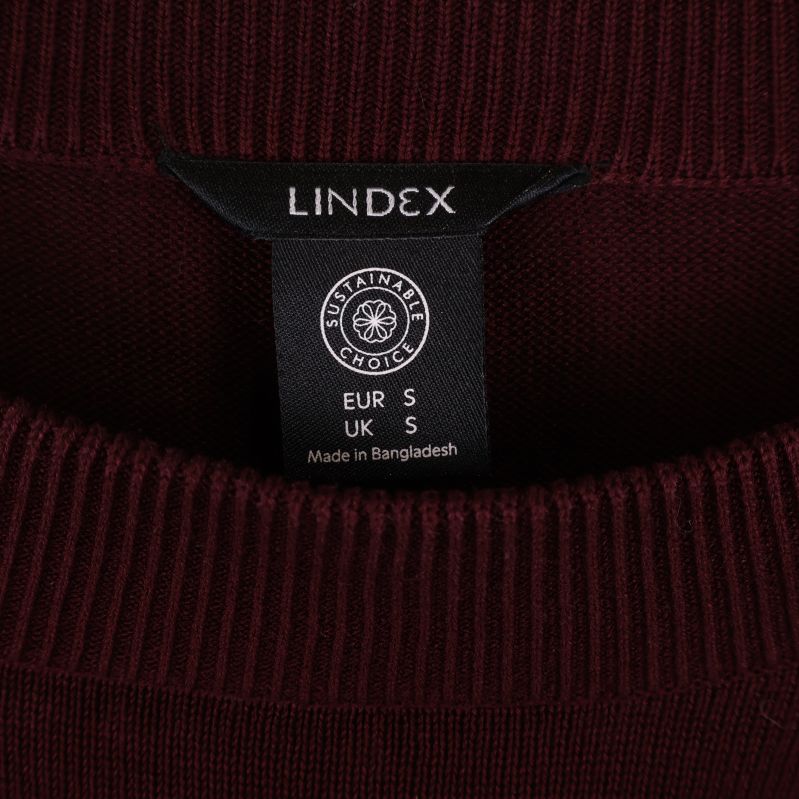 Lindex etikett med storleksinformation i tröjans hals