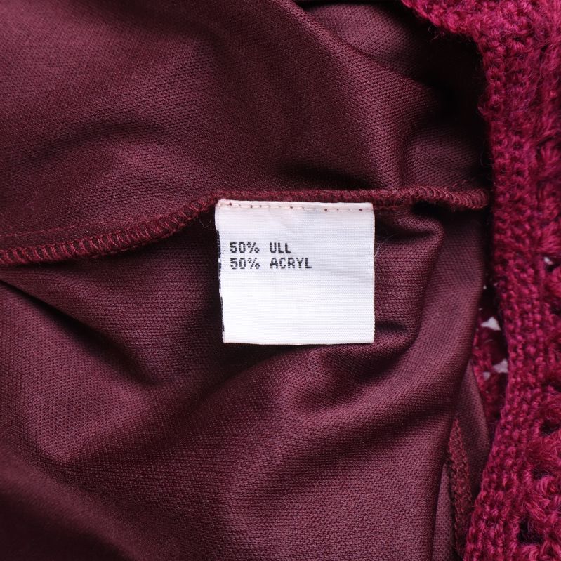 Materiallapp visar 50% ull och 50% akryl