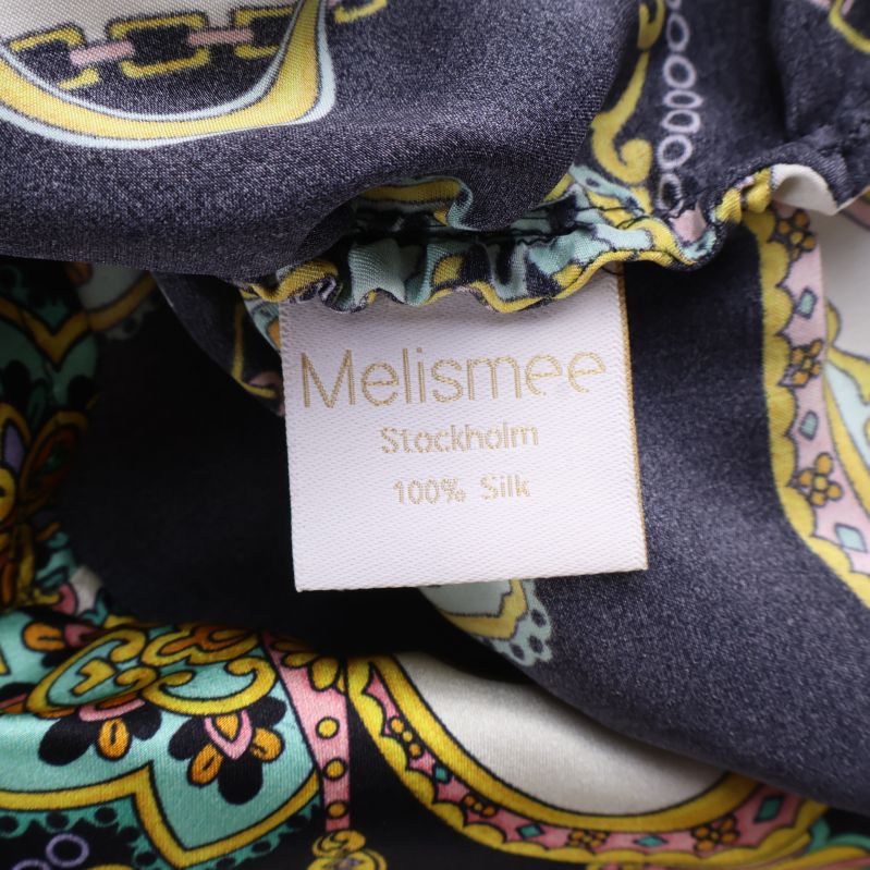 Materialetikett som visar 100% siden från Melismee Stockholm