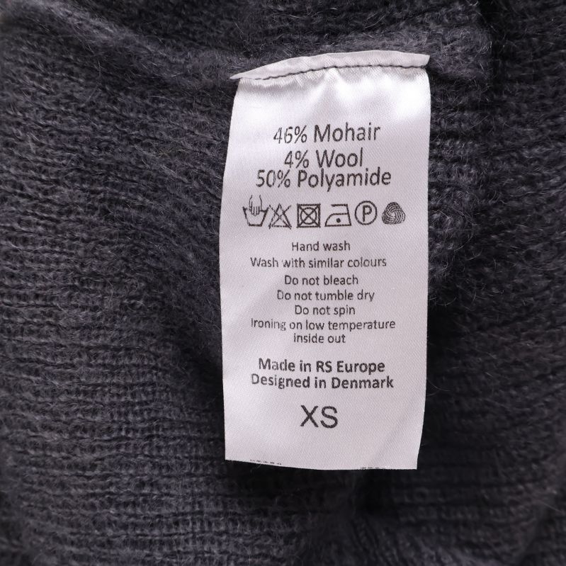 Tvätt- och materiallapp i koftan med sammansättning och skötselråd